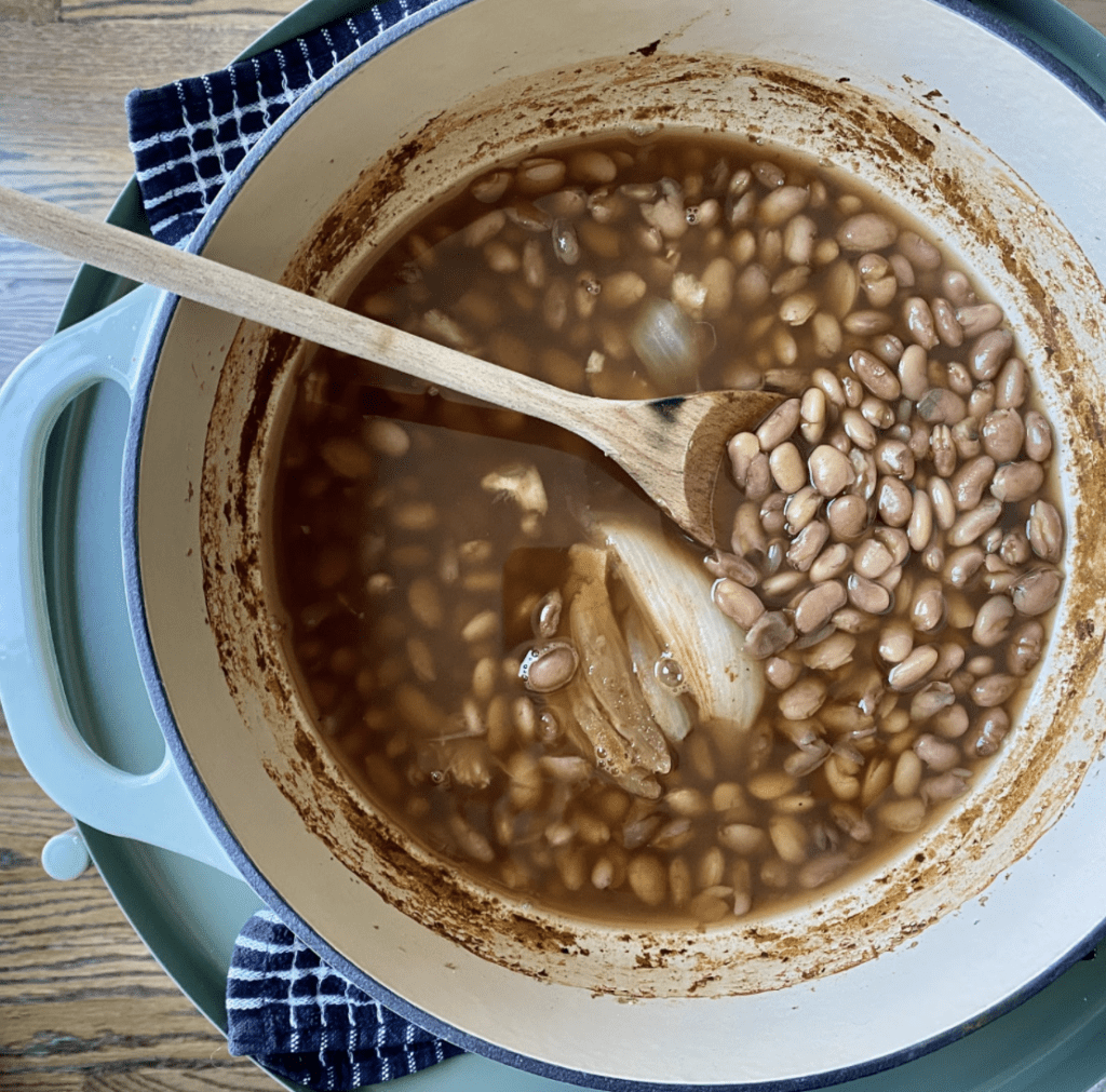 Photo of cooked beans in a pot.